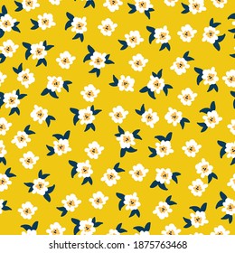 Cute floral pattern of the plants . Printing color in a flower. Seamless vector texture. White flowers . Yellow background. elegant template for fashionable prints.