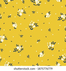 Patrón floral lindo de las plantas. Imprimiendo color en una flor. Textura vectorial sin inconvenientes. Pequeñas flores blancas. Fondo amarillo. elegante plantilla para impresiones de moda.