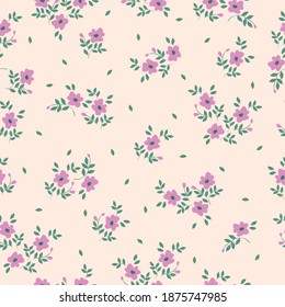 Cute floral pattern . Printing color in a flower. Seamless vector texture. Small pink flowers. Pale beige background. elegant template for fashionable prints.
