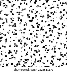 Cute floral pattern. Seamless vector texture. An elegant template for fashionable prints. Print with small black flowers and leaves. white background.