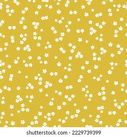 Patrón floral lindo. Textura vectorial sin inconvenientes. Una plantilla elegante para impresiones de moda. Impresión con flores blancas pequeñas . fondo amarillo.