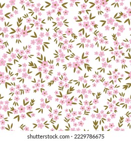 Cute floral pattern. Seamless vector texture. An elegant template for fashionable prints. Print with small pink flowers . white background.