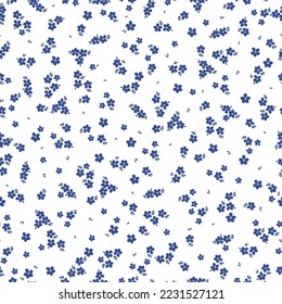 Cute floral pattern. Seamless vector texture. An elegant template for fashionable prints. Print with small dark blue flowers and leaves. white background.