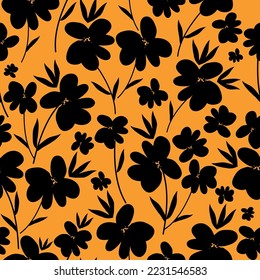 Cute floral pattern. Seamless vector texture. An elegant template for fashionable prints. Print with black flowers and leaves. orange background.