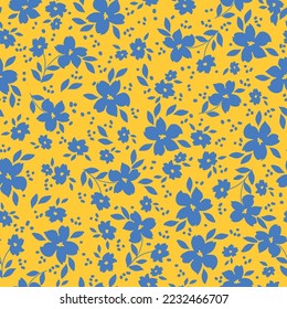 Cute floral pattern. Seamless vector texture. An elegant template for fashionable prints. Print with blue flowers and  leaves. yellow background.