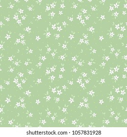Cute floral pattern in the small flower. Ditsy print. Motifs scattered random. Seamless vector texture. Elegant template for fashion prints. Printing with small white flowers. Blue background.