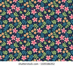 Cute floral pattern in the small flower. Ditsy print. Seamless vector texture. Elegant template for fashion prints. Printing with small rose-colored flowers. Dark blue background.
