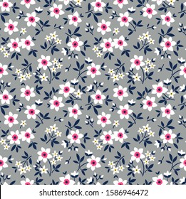 Cute floral pattern in the small flower. Ditsy print. Seamless vector texture. Elegant template for fashion prints. Printing with small white flowers. Pale gray background.