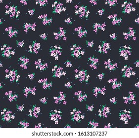 Cute floral pattern in the small flower. Ditsy print. Motifs scattered random. Seamless vector texture. Elegant template for fashion prints. Printing with small purple flowers. Dark blue background.