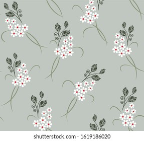 Cute Floral pattern in the small flower on green