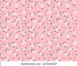 Cute floral pattern in the small flower. Ditsy print. Motifs scattered random. Seamless vector texture. Elegant template for fashion prints. Printing with small white flowers. Pale pink background.