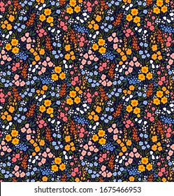 Cute floral pattern in the small flower. Ditsy print. Motifs scattered random. Seamless vector texture. Elegant template for fashion prints. Printing with small colorful flowers. Dark blue background.