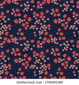 Cute floral pattern in the small flower. Ditsy print. Motifs scattered random. Seamless vector texture. Elegant template for fashion prints. Printing with small pink an flowers. Dark blue background.