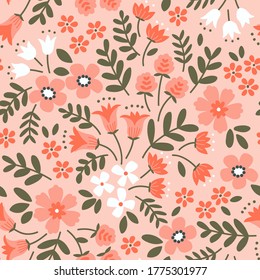 Cute floral pattern in the small flower. Ditsy print. Seamless vector texture. Elegant template for fashion prints. Printing with small coral flowers. Light orange background.