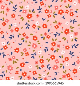 Patrón floral lindo en la flor pequeña. Textura vectorial sin inconvenientes. Elegante plantilla para impresiones de moda. ¿Imprimiendo con rojo pequeño? flores blancas. Fondo rosa. Vector de material para impresiones en la superficie.