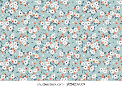 Cute floral pattern in the small flower. Seamless vector texture. Elegant template for fashion prints. Printing with small orange and white flowers. Blue background. Stock vector for prints.