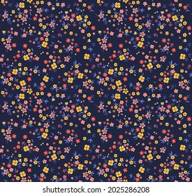 Cute floral pattern in the small flower. Seamless vector texture. Elegant template for fashion prints. Printing with small yellow  and red flowers. Dark blue background. Stock print.