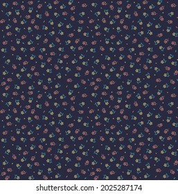 Patrón floral lindo en la flor pequeña. Textura vectorial sin inconvenientes. Elegante plantilla para impresiones de moda. Impresión con flores naranjas pequeñas. Fondo azul oscuro. Impresión de material.