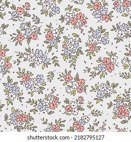 Cute floral pattern in the small flower. Seamless vector texture. Elegant template for fashion prints. Printing with small white, blue and pink flowers. Light white gray background. Stock print.