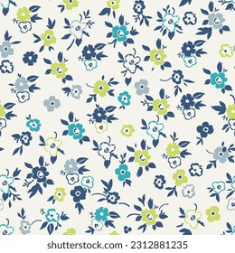 Cute floral pattern in a small flower. Seamless vector texture. An elegant template for fashionable prints. Print with small white and blue, green and light green flowers. Light background.