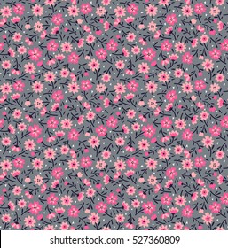 Cute Floral pattern in the small flower. "Ditsy print". Motifs scattered random. Seamless vector texture. Elegant template for fashion prints. Printing with small pink flowers. Gray background.
