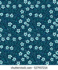 Cute Floral pattern in the small flower. "Ditsy print". Motifs scattered random. Seamless vector texture. Elegant template for fashion prints. Printing with very light blue flowers. Blue background.
