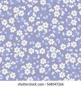 Cute Floral pattern in the small flower. "Ditsy print". Motifs scattered random. Seamless vector texture. Elegant template for fashion prints. Printing with very small white flowers. Lilac background.