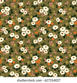 Cute floral pattern in the small flower. Ditsy print. Seamless vector texture. Elegant template for fashion prints. Printing with small multicolored flowers. Gold background.