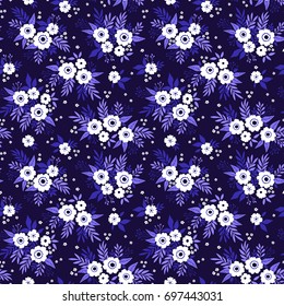 Cute floral pattern in the small flower. Ditsy print. Seamless vector texture. Elegant template for fashion prints. Printing with small white flowers. Dark blue background.