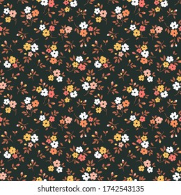 Cute floral pattern in the small flowers. Ditsy print. Motifs scattered random. Seamless vector texture. Elegant template for fashion prints. Printing with small yellow flowers. Black background.