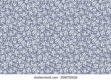 Cute floral pattern in the small flowers. Seamless vector texture. Elegant template for fashion prints. Printing with small white flowers. Gray blue background. Ditsy style.