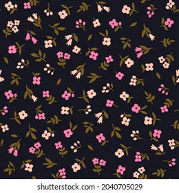 Cute floral pattern in the small flowers. Seamless vector texture. Elegant template for fashion prints. Printing with small pink flowers. Dark black blue  background.