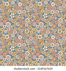 Cute floral pattern in the small flowers. Seamless vector texture. Vintage template for fashion prints. Printing with small colorful flowers. Pale gray blue background.