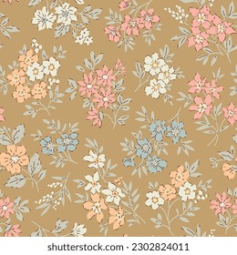 Cute floral pattern in small flowers. Small colorful flowers. Gold beige background. Delicate ditsy print. Floral seamless background. Elegant template for fashion prints. Stock pattern.