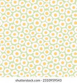 Cute floral pattern in the small flowers. Seamless vector texture. Elegant template for fashion prints. Printing with small white chamomile flowers. Light green background. Stock print.
