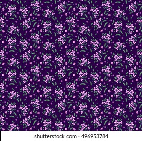 Cute Floral pattern of small flowers. "Ditsy print". Seamless vector texture. Elegant template for fashion prints. Very small lilac flowers on dark blue background.
