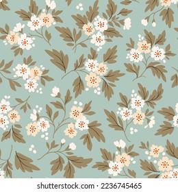 Cute floral pattern. Small white flowers. Pale light blue background. Ditsy print. Floral seamless background. Trendy template for fashion prints. Stock pattern.