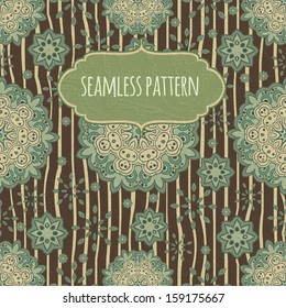 Cute floral seamless pattern in brown color