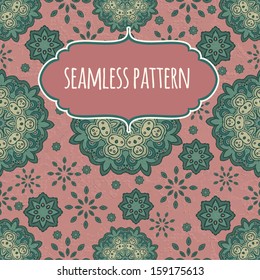 Cute floral seamless pattern in pink and green colors