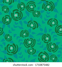 Cute floral seamless pattern in the small flowers.  Abstract green simple romantic textile. Pretty plants background. Nature graphic illustration in doodle style.
