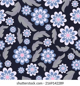 Cute floral seamless pattern. Vintage flowers and leaves of different sizes are randomly arranged on a black background. Vector.
