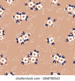 Cute flower pattern in small flowers. Seamless vector texture. Elegant template for fashionable prints. Print with white flowers. Beige background.