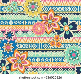 cute flowers over tribal seamless background