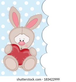 Cute fluffy rabbit with heart