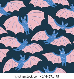 Cute flying bats in different poses.Vector hand-drawn seamless pattern design for fabric, wallpaper or wrapping paper. Kids print.