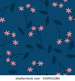Cute folk style small pink flowers composition. Seamless vector pattern on blue background.