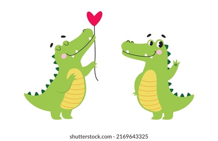 Cute friendly green crocodiles set. Lovely baby alligators cartoon vector illustration