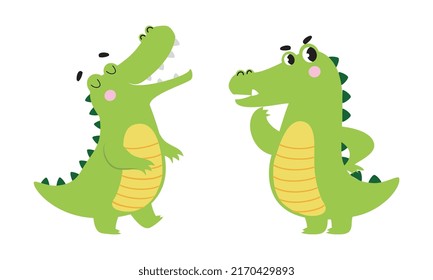 Cute friendly green crocodiles set. Lovely curious baby alligators characters cartoon vector illustration