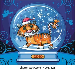 Cute friendly tiger, wearing Santa cap, with candy cane tale. Inside of the snow-dome. 2010 is the Year of the tiger according to the Chinese Zodiac.