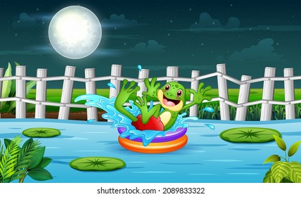 Cute frog cartoon on an inflatable circle in the river at night